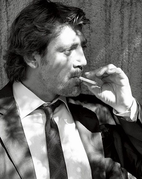Javier Bardem smoking a cigarette (or weed)
