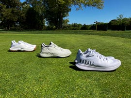 golf shoes on a green background