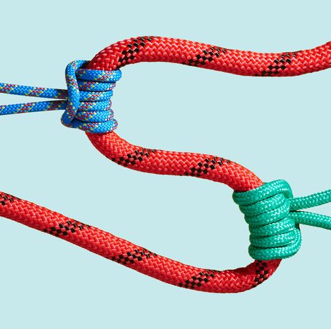 climbing ropes tied together on blue background gut health stomach in knots