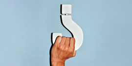 hand holding a big white question mark
