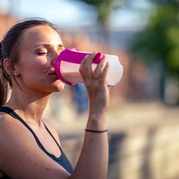 woman drinking protein shake