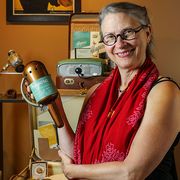 Carol Queen, the staff sexologist at Good Vibrations, holds a 1940s-era Niagara vibrator, part of the store’s extensive collection of antique sex toys.