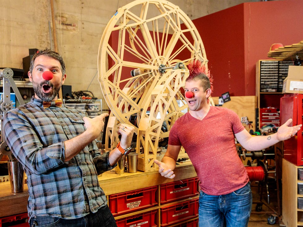 Co-founders Brent Bushnell and Eric Gradman clown around with prototypes in Two Bit Circus’ company workshop in Los Angeles.