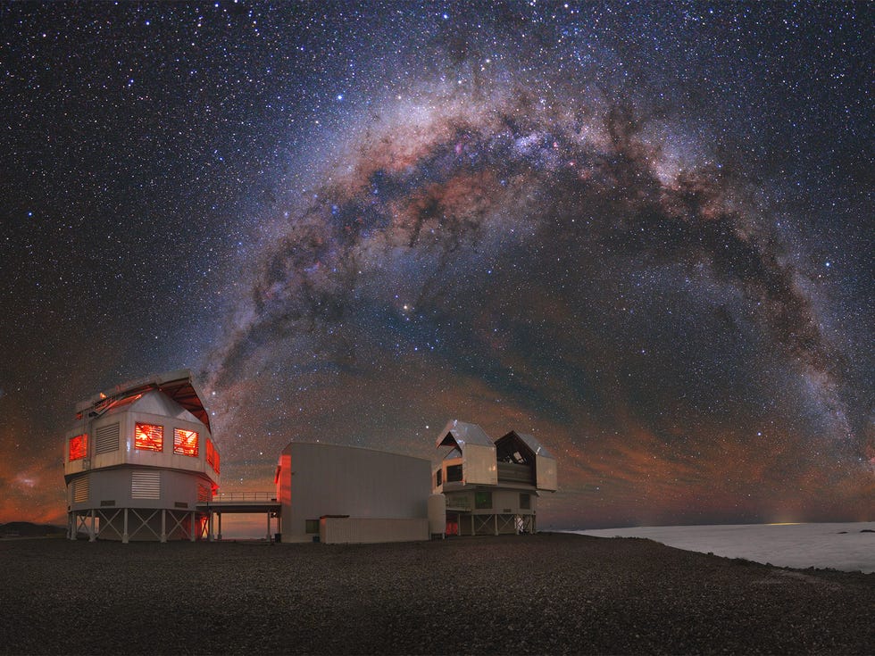 The Milky Way shines over the Las Campanas observatory in Chile, one of the facilities that helped to confirm the existence of gravitational waves last summer. The orange cloudlike effect in the sky comes from an especially bright atmospheric afterglow.
