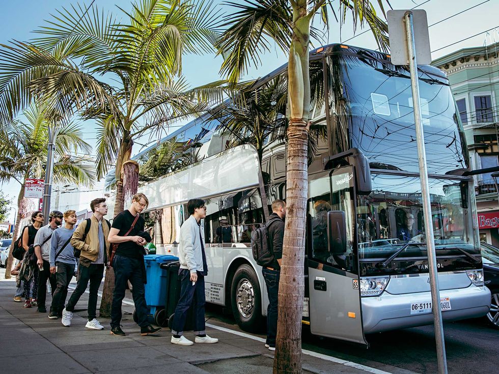 Tech company workers line up to board a commuter bus from San Francisco to Silicon Valley. The tech industry’s workforce is overwhelmingly male.