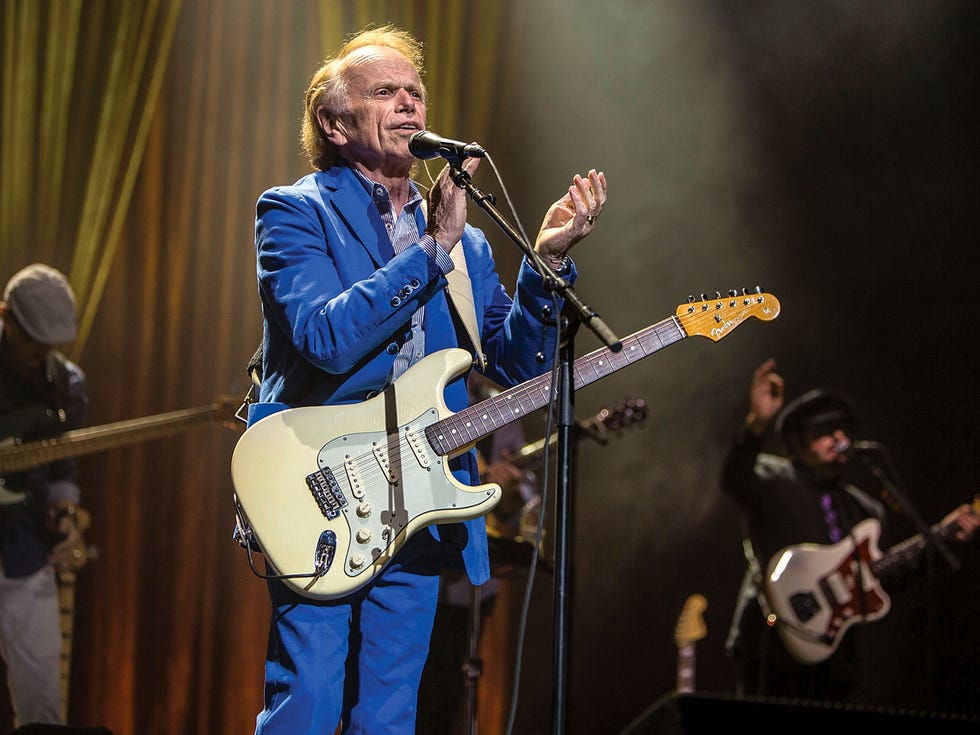 Al Jardine backing up his cousin Brian Wilson at a show in San Diego in May.
