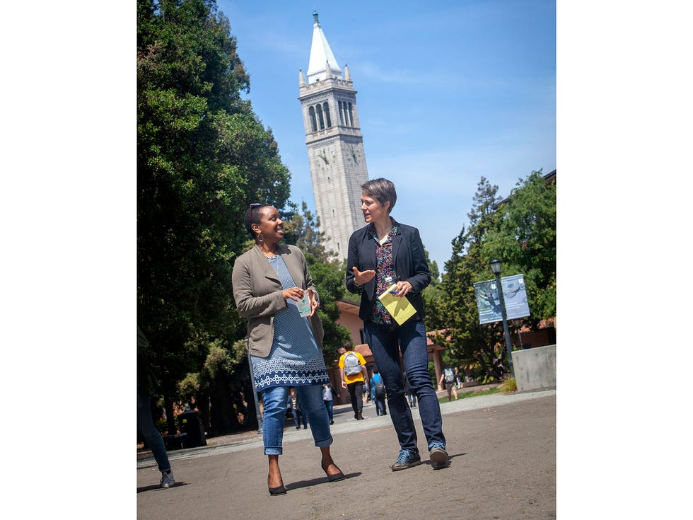 Molly Shaffer Van Houweling (right), walks on the campus of the University of California with Abbye Atkinson during finals week.