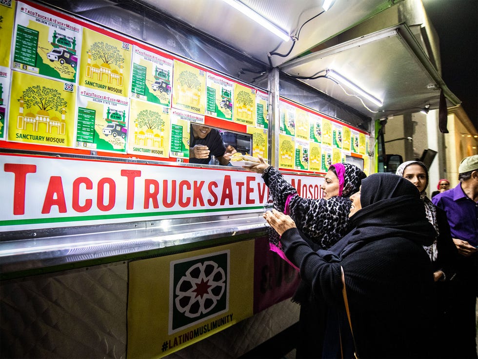 Muslim customers line up and chow down at a Taco Trucks at Every Mosque event at the Islamic Society of Orange County in Garden Grove, illustrating the increasing ethnic diversity and mix in Orange County.