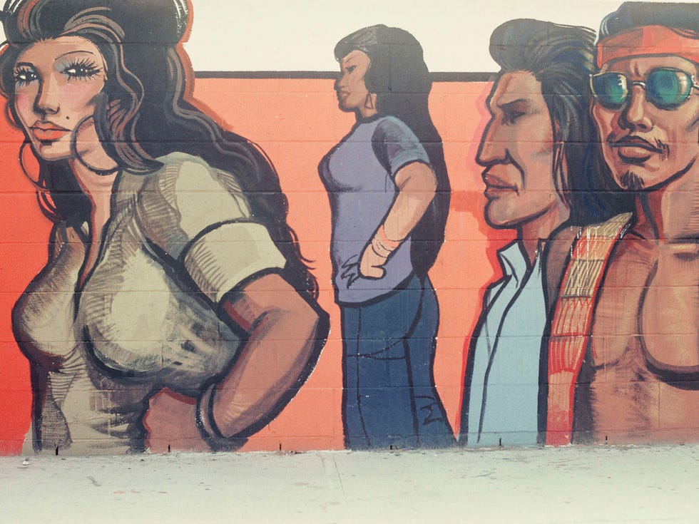 Sergio O’Cadiz Moctezuma and residents of Fountain Valley’s Colonia Juarez community painted the "Fountain Valley Mural" from 1974 to 1976. The mural’s story of Mexican American heritage and history unfolded along a 625-foot-long wall separating the barrio from a newer development. Starved of funding, the mural was executed only by volunteers and was never coated in a protective sealant. In 2001, following input from city-sponsored surveys about the mural’s decay, the wall was razed and a new wall was built in its place.