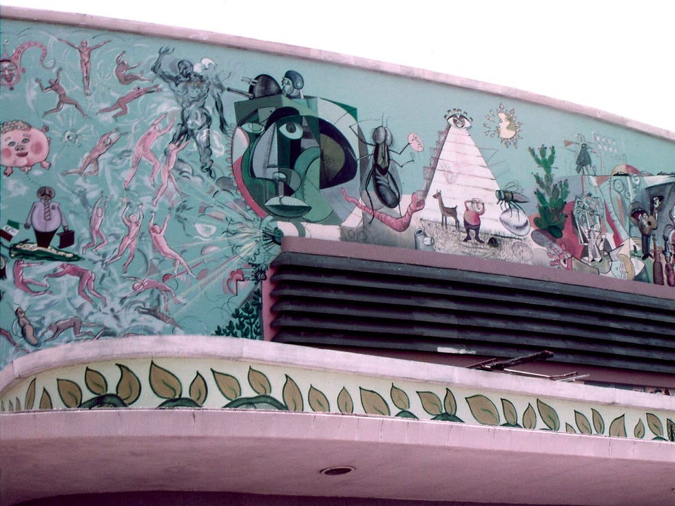 Detail from "The Path to Knowledge and the False University" by Roberto Chavez, 1974. Chavez painted the mural on the façade of Rosco C. Ingalls Auditorium at East Los Angeles College with the goal of encouraging students to join the college’s new Chicana/o Studies department. But the mural’s avant-garde design, incorporating surrealist, cartoonish, and symbolic forms in varying scales, and its challenging social messages, led to its whitewashing by the college administration
