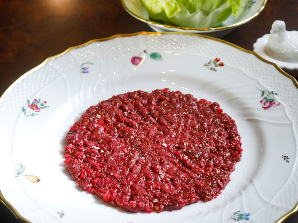 Antelope tartare is served with lettuce cups.
