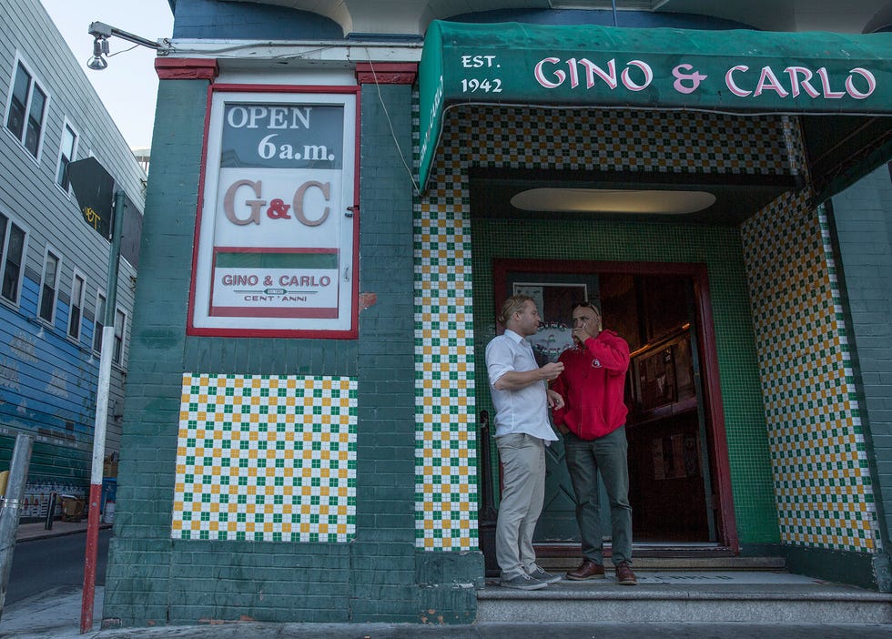 Gino & Carlo's at 6 a.m. is full with locals and regulars sitting around reading the paper, drinking coffee — and  beers or shots.