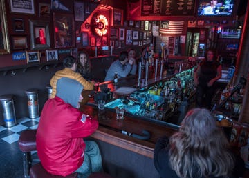 The early morning crowd at Pop's bar in San Francisco's Mission District.