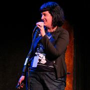 Bonnie Burton performs comedy on stage at w00tstock San Francisco in 2010.