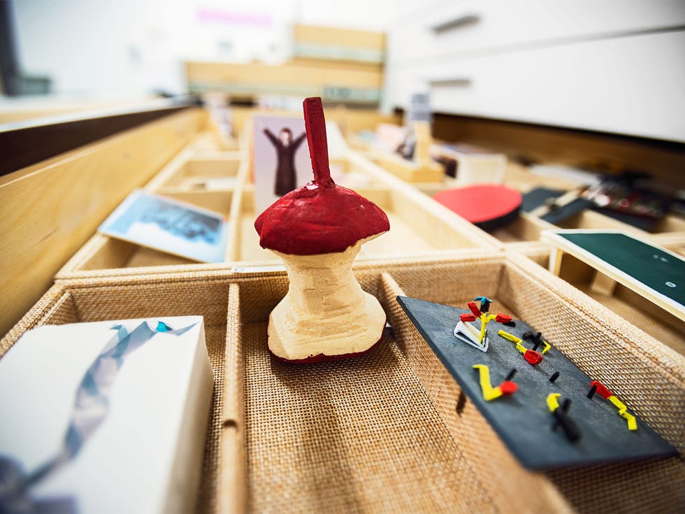 A miniature version of the sculpture Geometric Apple Core, by Claes Oldenburg and Coosje van Bruggen.
