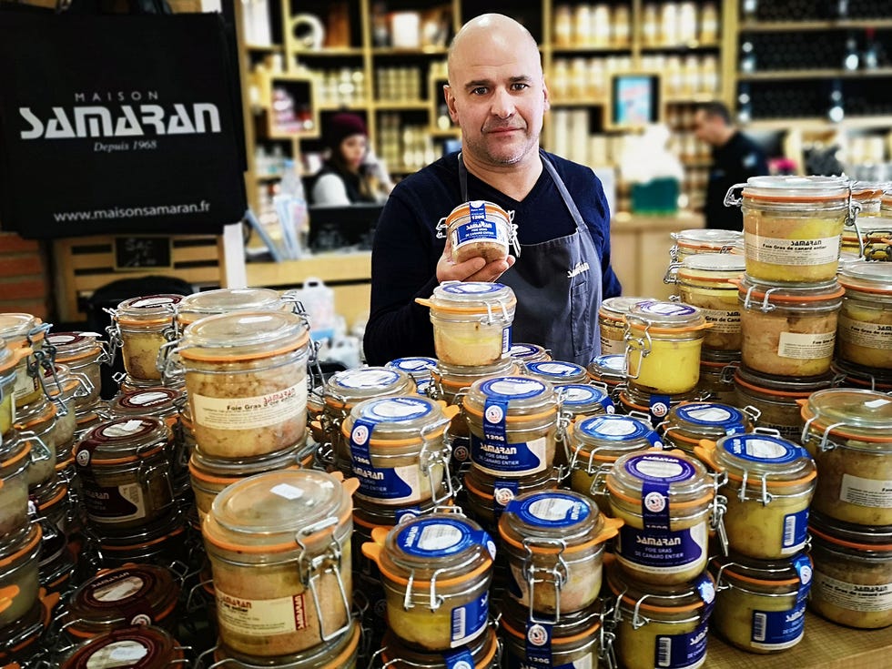 Christophe Samaran holds a jar of foie gras at the boutique that bears his family’s name. Samaran is one of the Gascony region’s most celebrated producers and sellers of foie gras.
