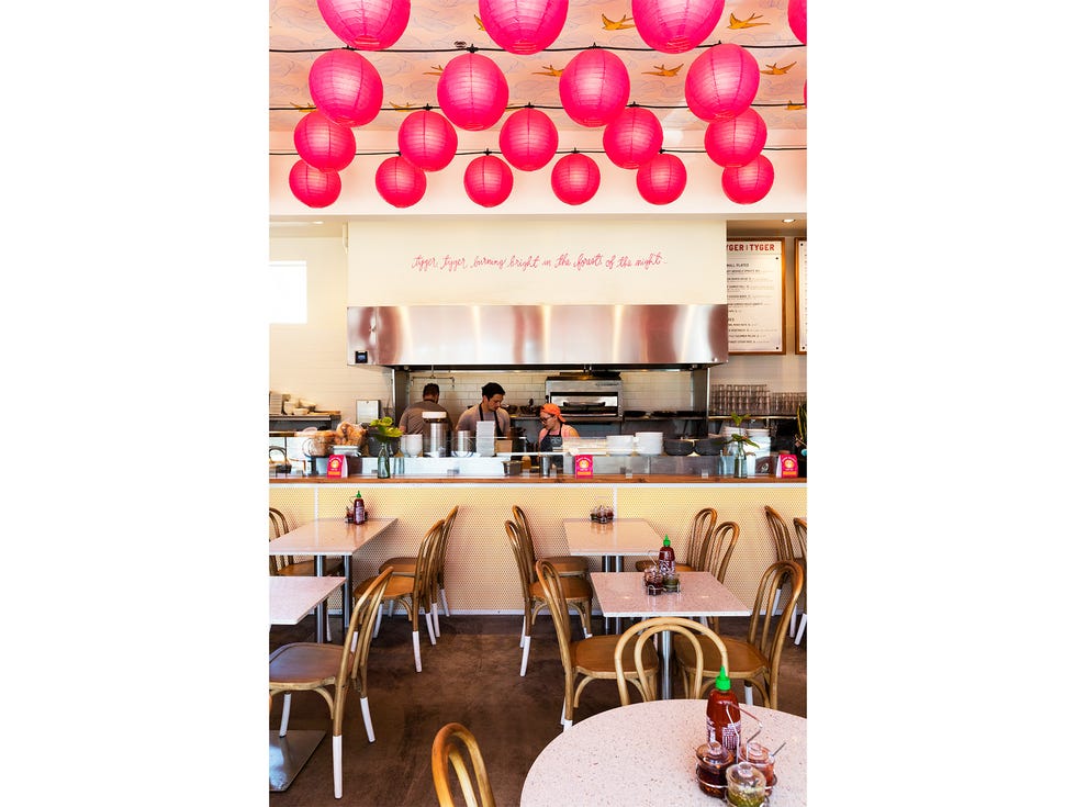 The open kitchen and casual seating suit the emphasis on Southeast Asian street food.
