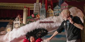 Tammy Nelson performs the finale of Beach Blanket Babylon wearing a San Francisco skyline hat and Alan Greenspan, the show’s longtime hat designer and maker.