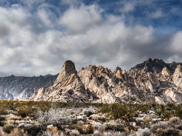 a view of the providence mountains from the desert floor in the mojave national preserve