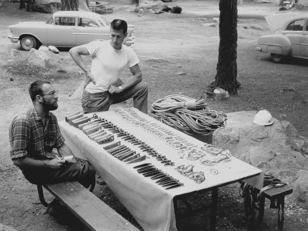 Royal Robbins (left) and T.M. Herbert assess gear choices in Camp 4 in preparation for their second ascent attempt of Salathé Wall, in September 1962.