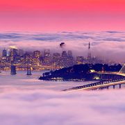 A sunset “fog sandwich” engulfs the City by the Bay at dusk in this photograph from San Francisco on Instagram.