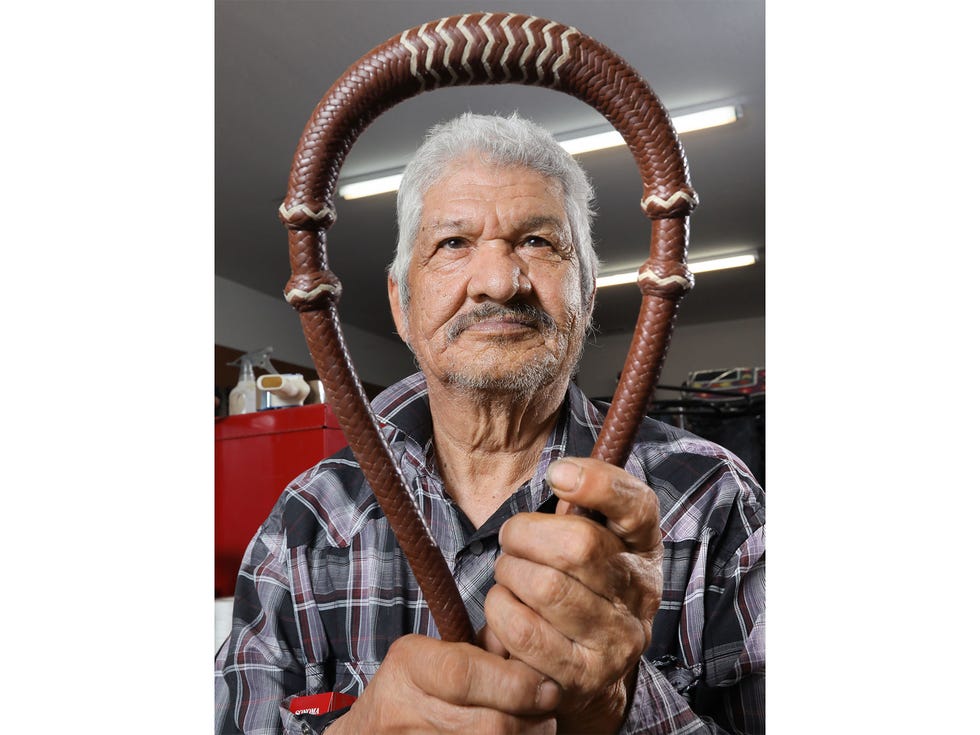 Modesto Medina holds a rawhide-core braided bosal he created. He has made romal reins for Dale Chavez Saddles in Temecula, California, since 1975.