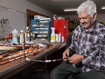 Modesto Medina creates a romal reins for Dale Chavez Saddles.