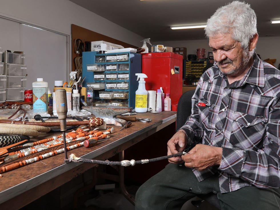 Modesto Medina creates a romal reins for Dale Chavez Saddles.