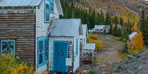 century old houses stand empty at the former idarado mine, near silverton, colorado, the homes were moved here in 1948 from eureka, a nearby ghost town