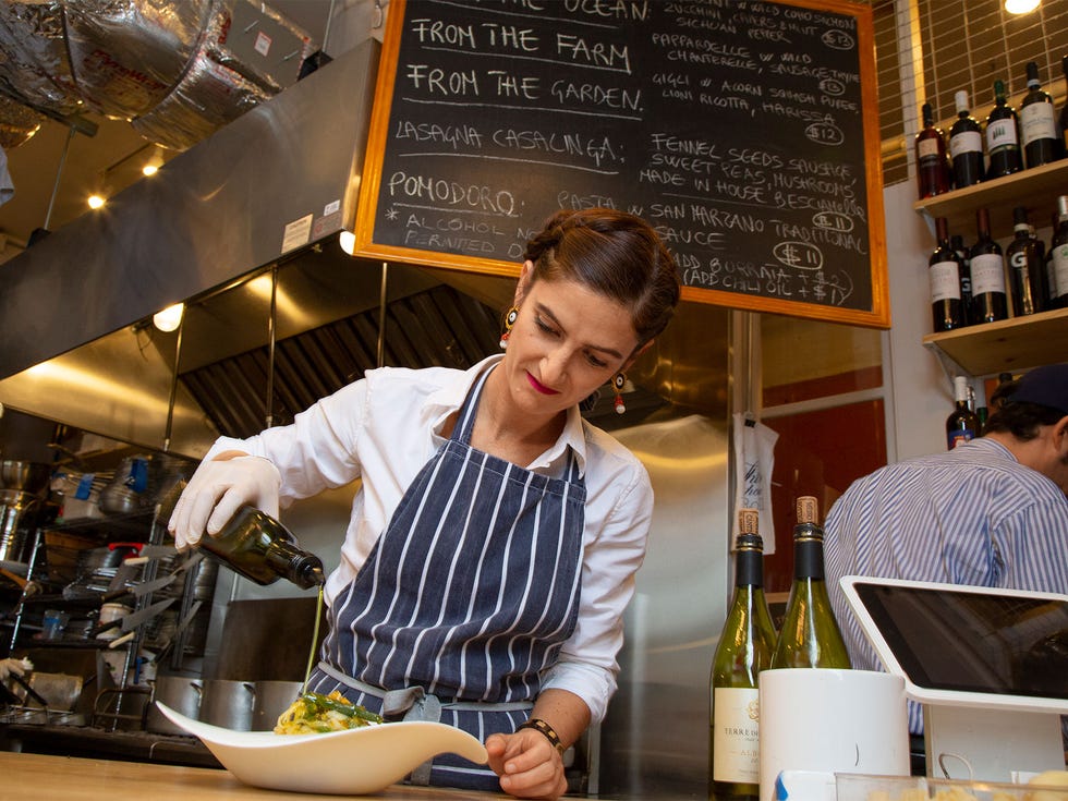 Michela Tartaglia prepares a lunch dish at Pasta Casalinga.