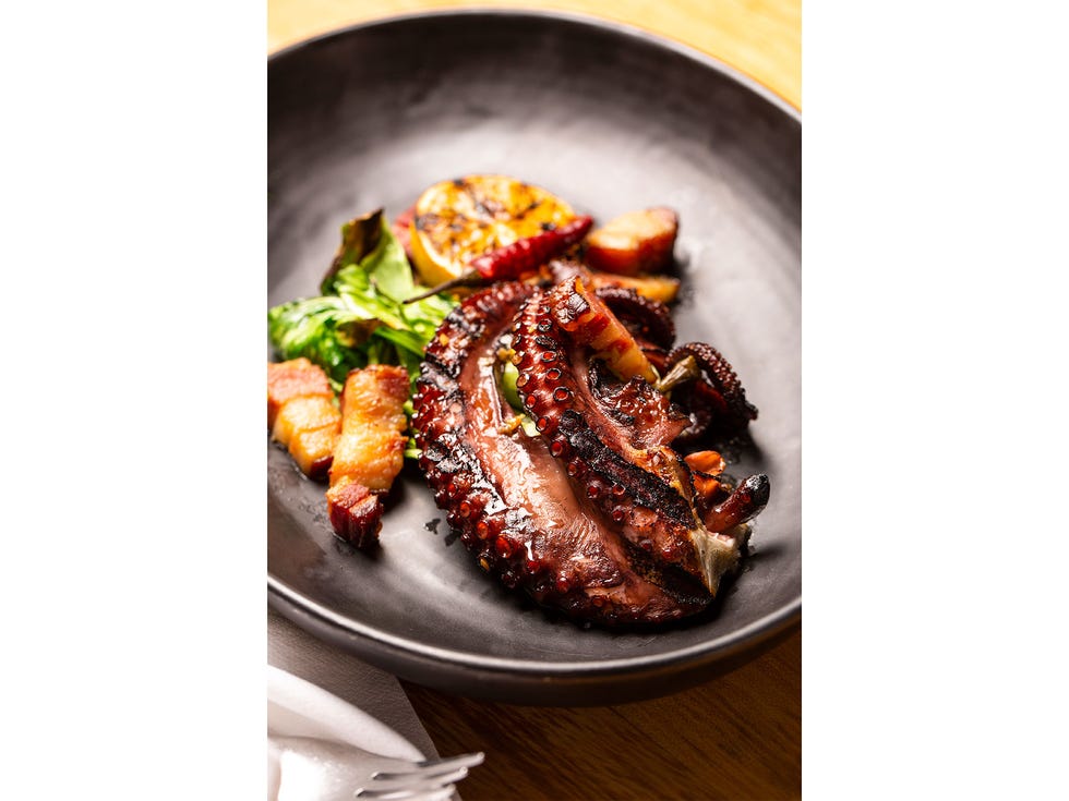 Octopus with bok choy and hot bacon vinaigrette.