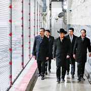 Members of the norteño band Los Tigres del Norte walk the grounds of Folsom State Prison in April 2018. Their concert there is the subject of a Netflix documentary, Los Tigres del Norte at Folsom Prison, and was recorded for a live album of the same name.
