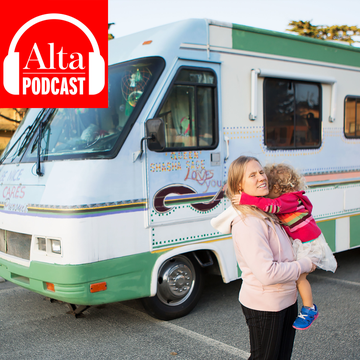 a homeless woman and her son live in a parking lot designated for people experiencing housing insecurity