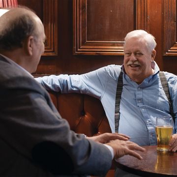 alta editor and publisher will hearst left and writer armistead maupin enjoy pints of ale at comptons of soho, a london pub