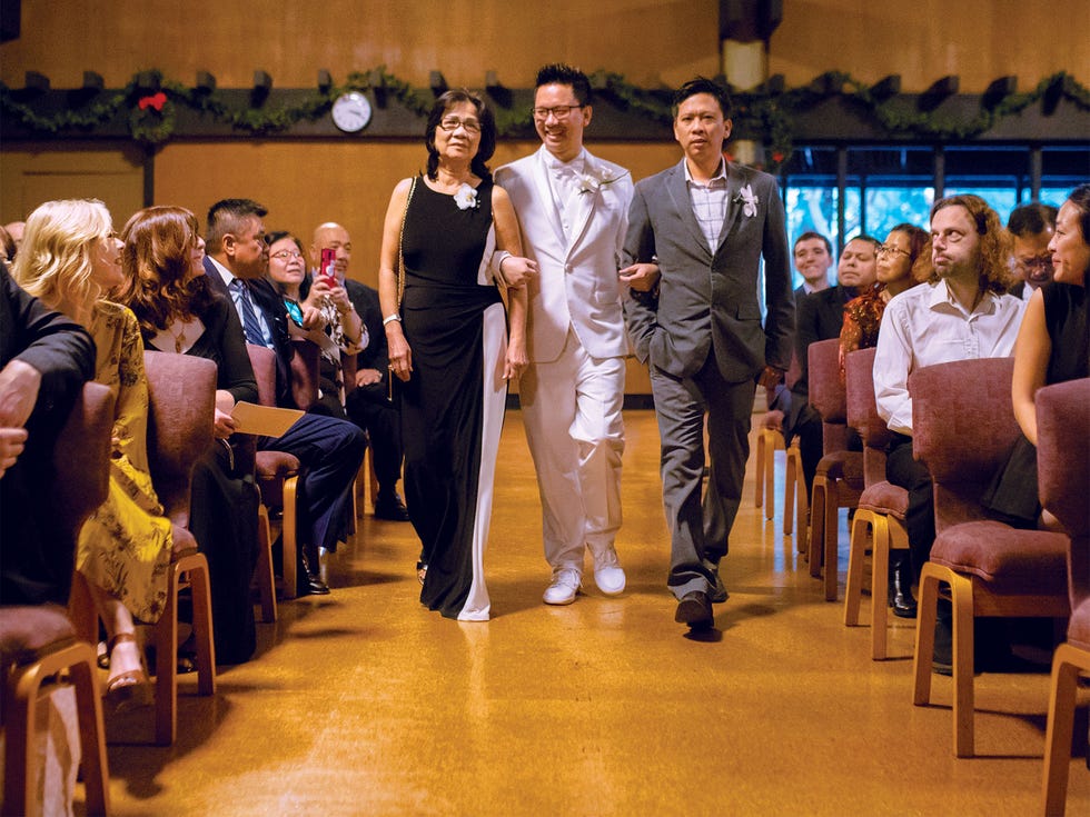 In 2018, Nguyen walked her son Minh Pham (center) down the aisle at his wedding, with Tommy Pham, Minh’s brother (right).