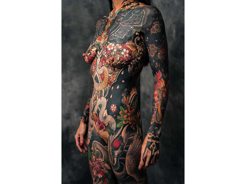 KeaLani Lada’s neo-Japanese bodysuit in the art nouveau style was created by Jayme Goodwin. To Lada, the artwork represents “the triumph of joy over pain.”