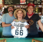 ATA063020route66_img16 en route to their final destination of santa monica, the author far right, her husband, ed, and their son, isaac, stop at the bagdad cafe located in the mojave desert, it was the filming location for the 1987 german film of the same name