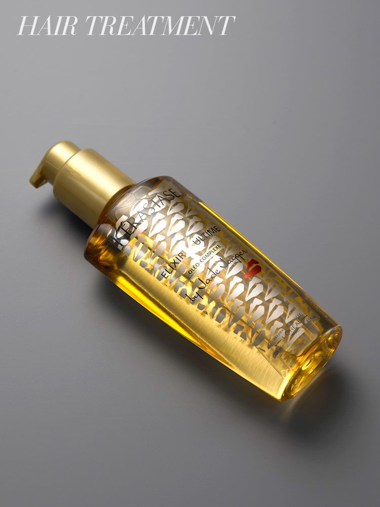 Product, Yellow, Bottle, Amber, Metal, Font, Brass, Glass bottle, Gold, Automotive light bulb, 