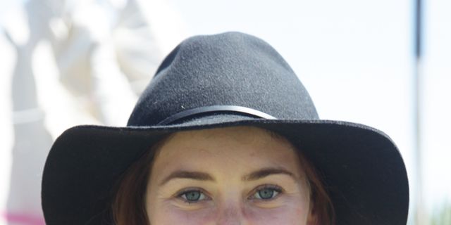 Clothing, Hat, Smile, Hairstyle, Chin, Fashion accessory, Facial expression, Jewellery, Style, Sun hat, 