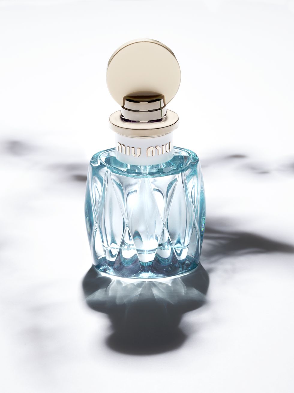 Perfume, Blue, Aqua, Product, Bottle, Glass bottle, Water, Glass, Liquid, Still life photography, 