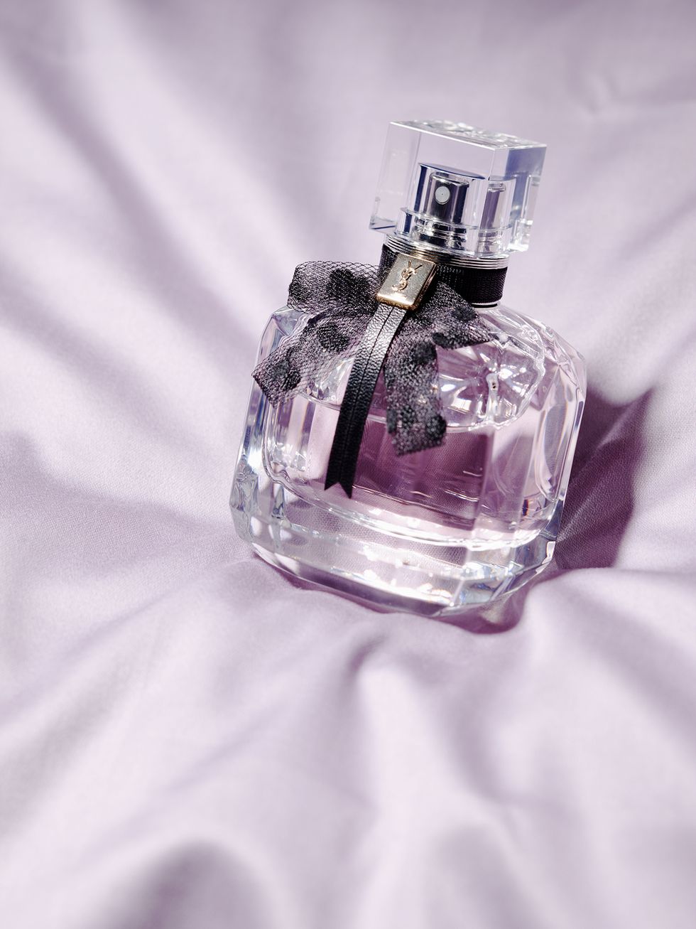 Perfume, Product, Glass bottle, Liquid, Purple, Violet, Water, Bottle, Material property, Glass, 