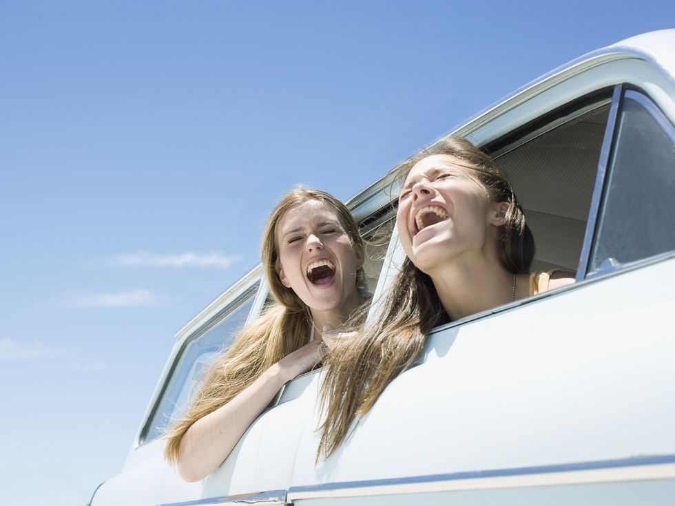 Nose, Mouth, Eye, Hairstyle, Shoulder, Happy, Leisure, Facial expression, Vehicle door, Automotive exterior, 