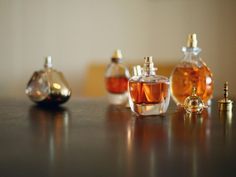 Liquid, Fluid, Bottle, Amber, Glass bottle, Distilled beverage, Perfume, Whisky, Still life photography, Solvent, 