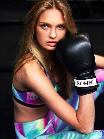 Boxing glove, Boxing, Boxing equipment, Combat sport, Contact sport, Arm, Striking combat sports, Glove, Finger, Photo shoot, 