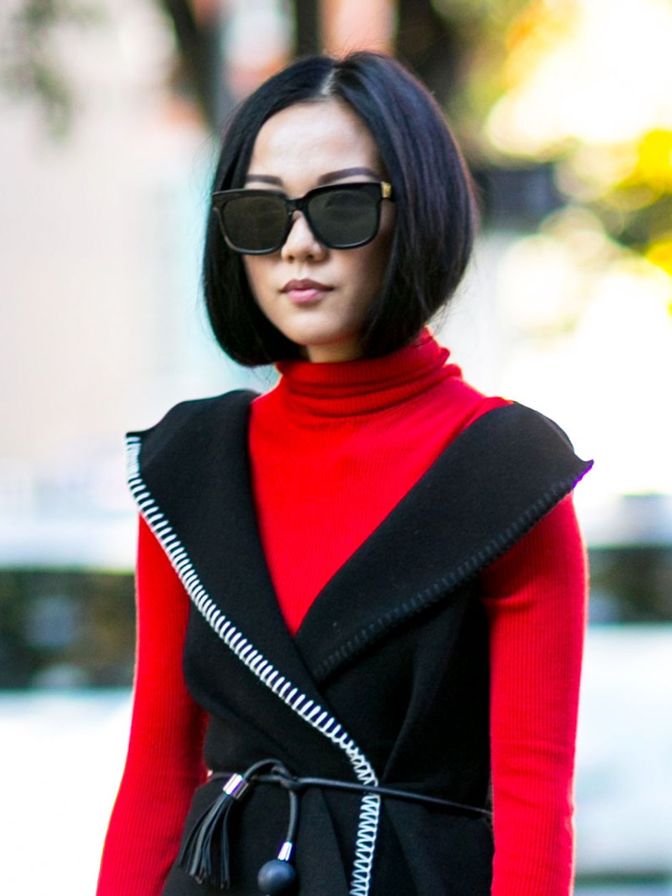 Clothing, Eyewear, Vision care, Sleeve, Textile, Red, Outerwear, Sunglasses, Style, Street fashion, 