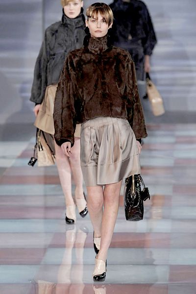Clothing, Leg, Brown, Sleeve, Shoulder, Textile, Fashion show, Joint, Outerwear, Style, 