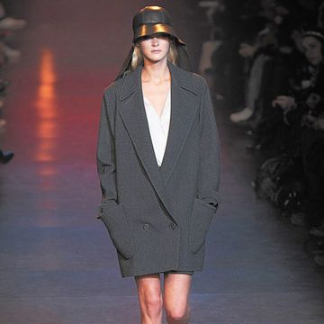 Clothing, Fashion show, Sleeve, Hat, Shoulder, Joint, Outerwear, Runway, Fashion model, Style, 