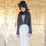 Sleeve, Textile, Standing, Photograph, White, Style, Headgear, Costume accessory, Black, Street fashion, 