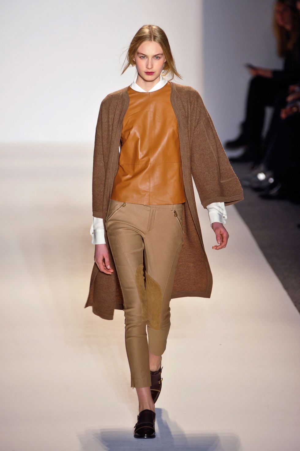 Brown, Fashion show, Sleeve, Shoulder, Textile, Joint, Outerwear, Runway, Style, Fashion model, 