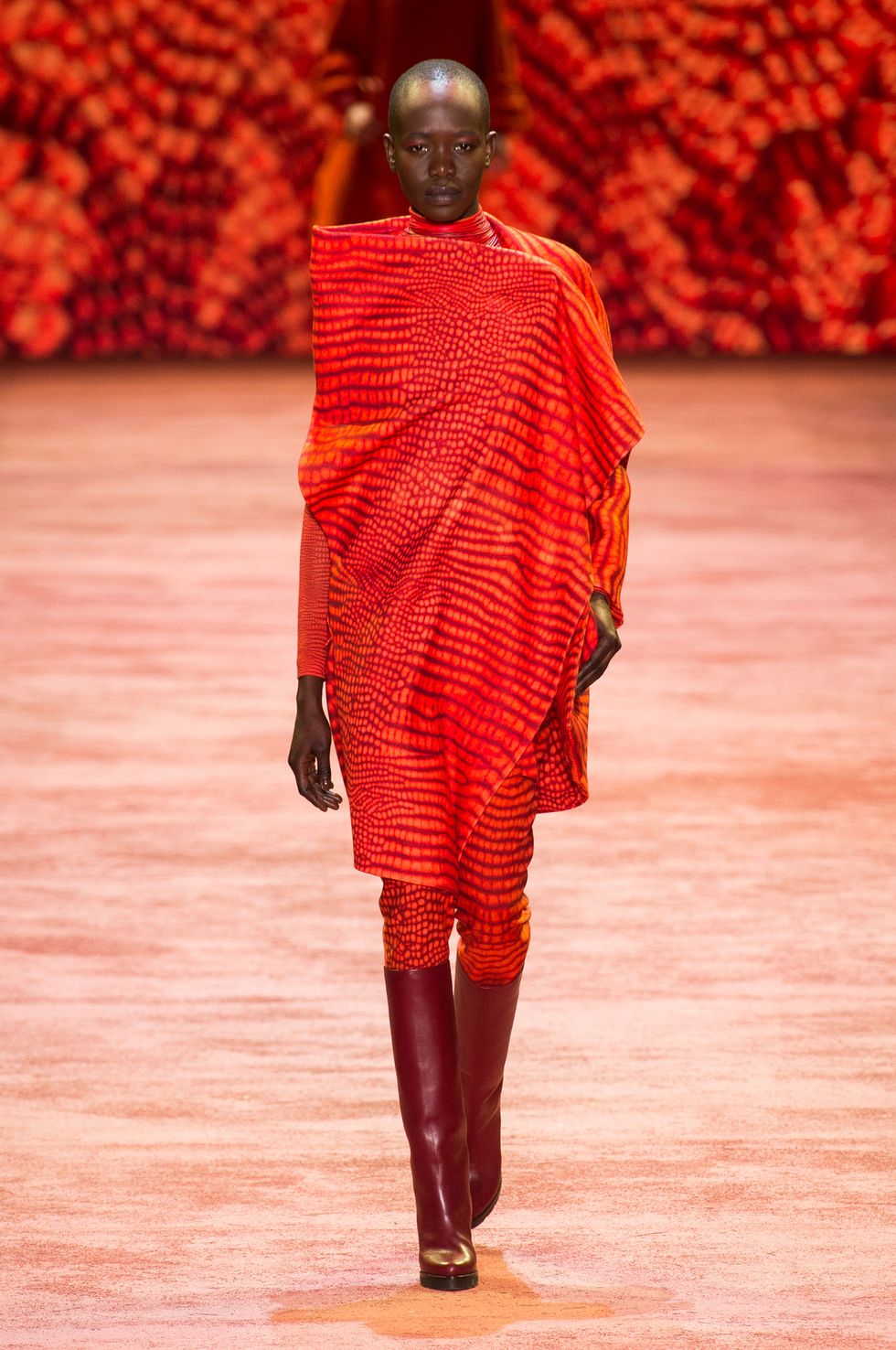 Textile, Joint, Red, Fashion show, Orange, Runway, Fashion, Fashion model, Knee, Street fashion, 